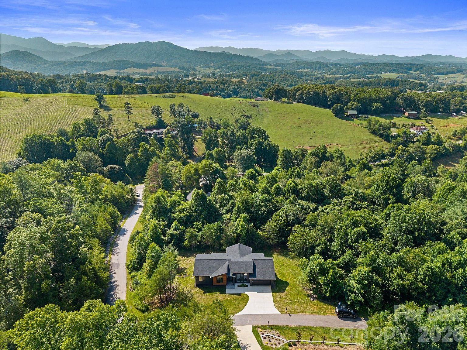Aerial of the property and Blue Ridge mountains